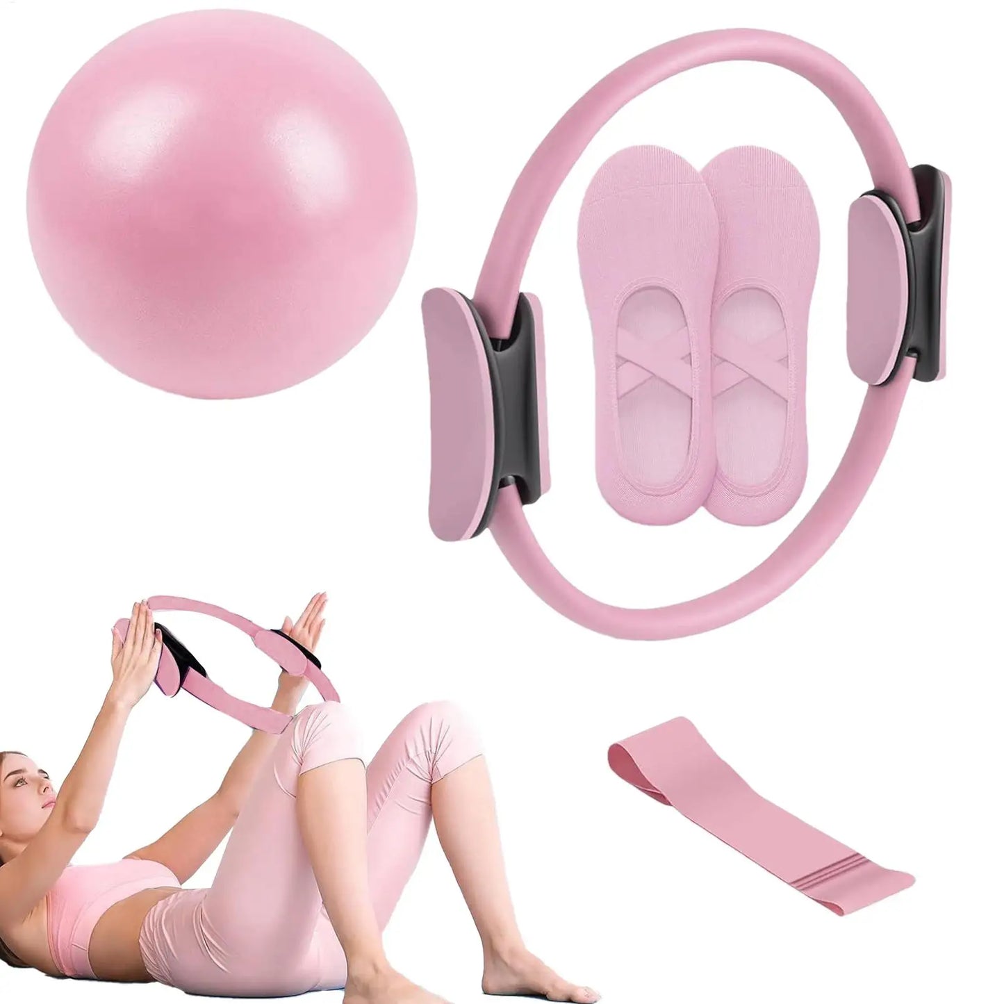 Pink exercise ball, resistance band, and other fitness equipment on a white background
