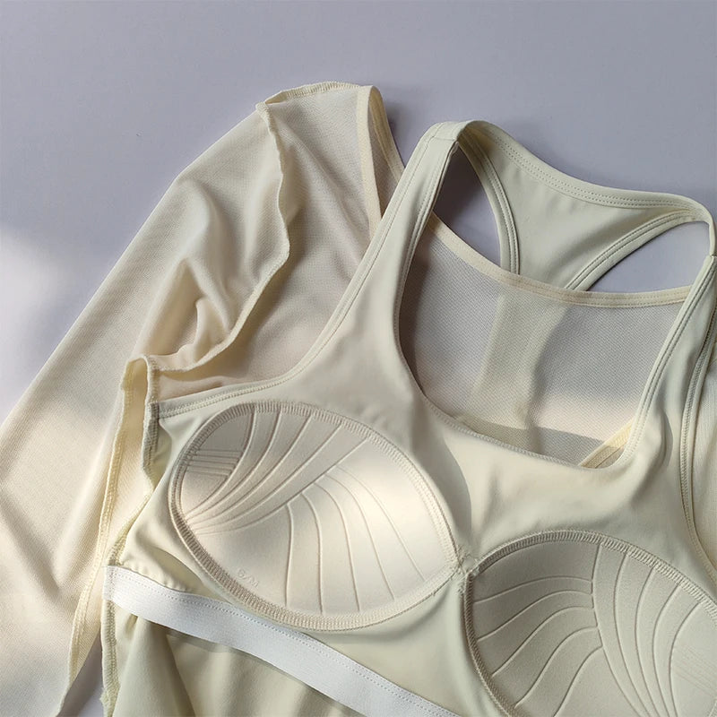 Beige crop top and wrap top set on a light gray background